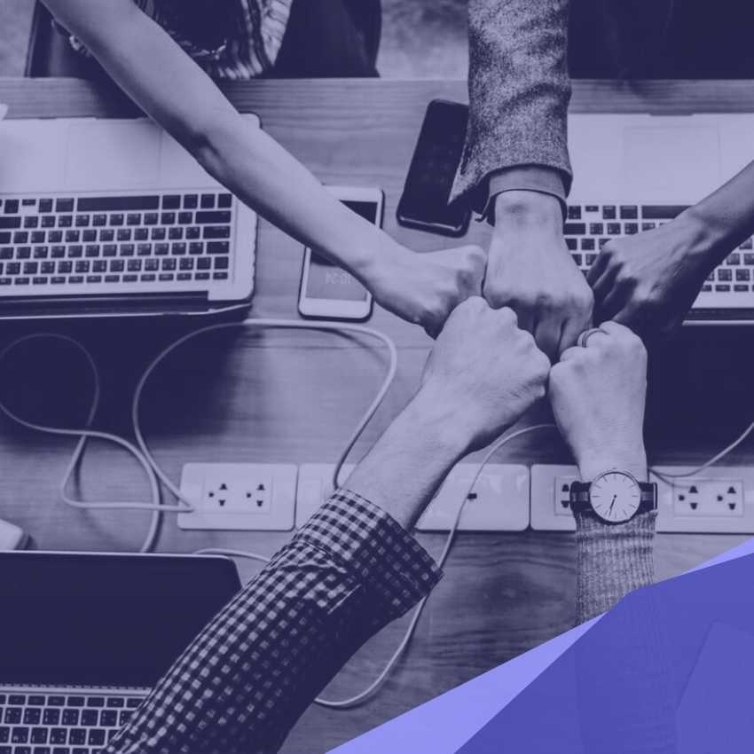 Toronto IT support team fist bumping with clients